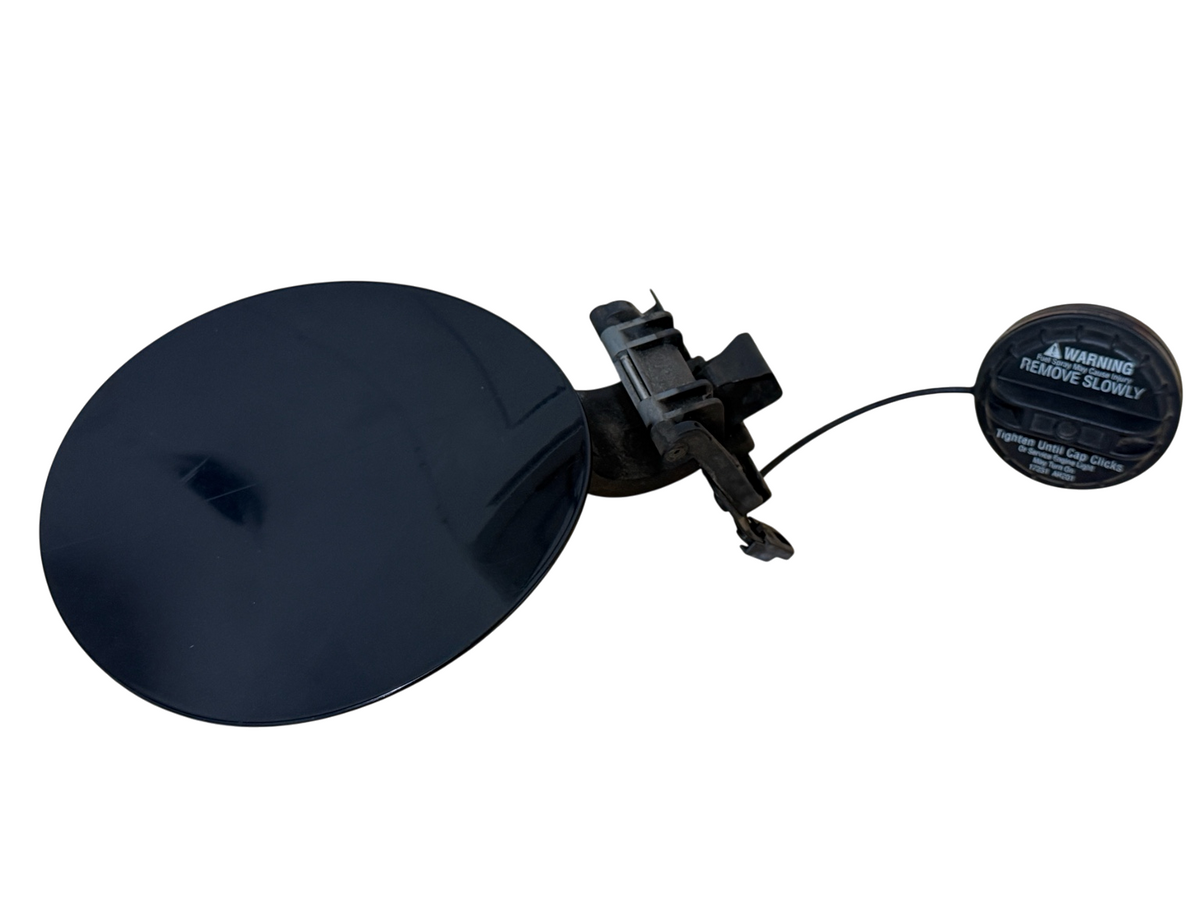 OEM Fuel Door Assembly Gas Cap 78830-AC803 for 2004-2007 Infiniti G35 Coupe - actual used OEM auto part, photo 1