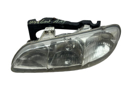 Pontiac Grand AM : 1996, 1997, 1998, Left Driver Headlight With Bracket OEM - actual used OEM auto part, photo 1